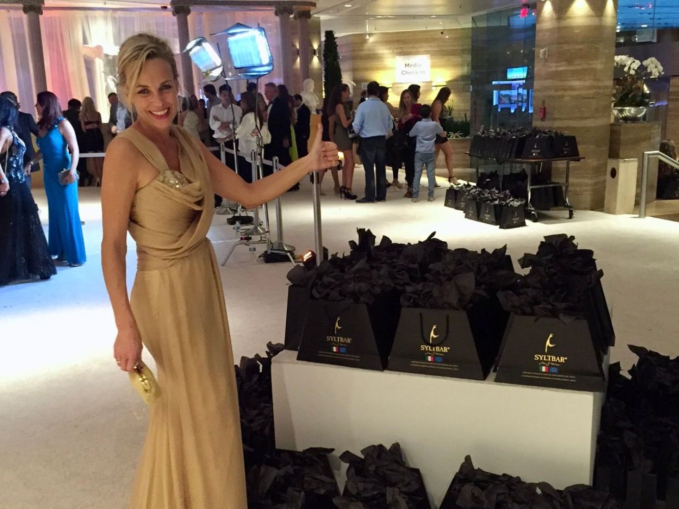 photo of SYLTBAR owners Regina at a charitable fundraiser