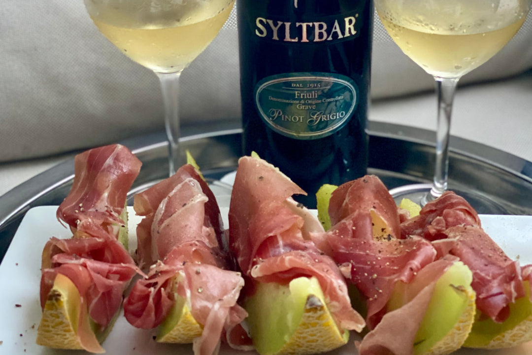 Melon and Serrano Ham with our White Linen Pinot Grigio