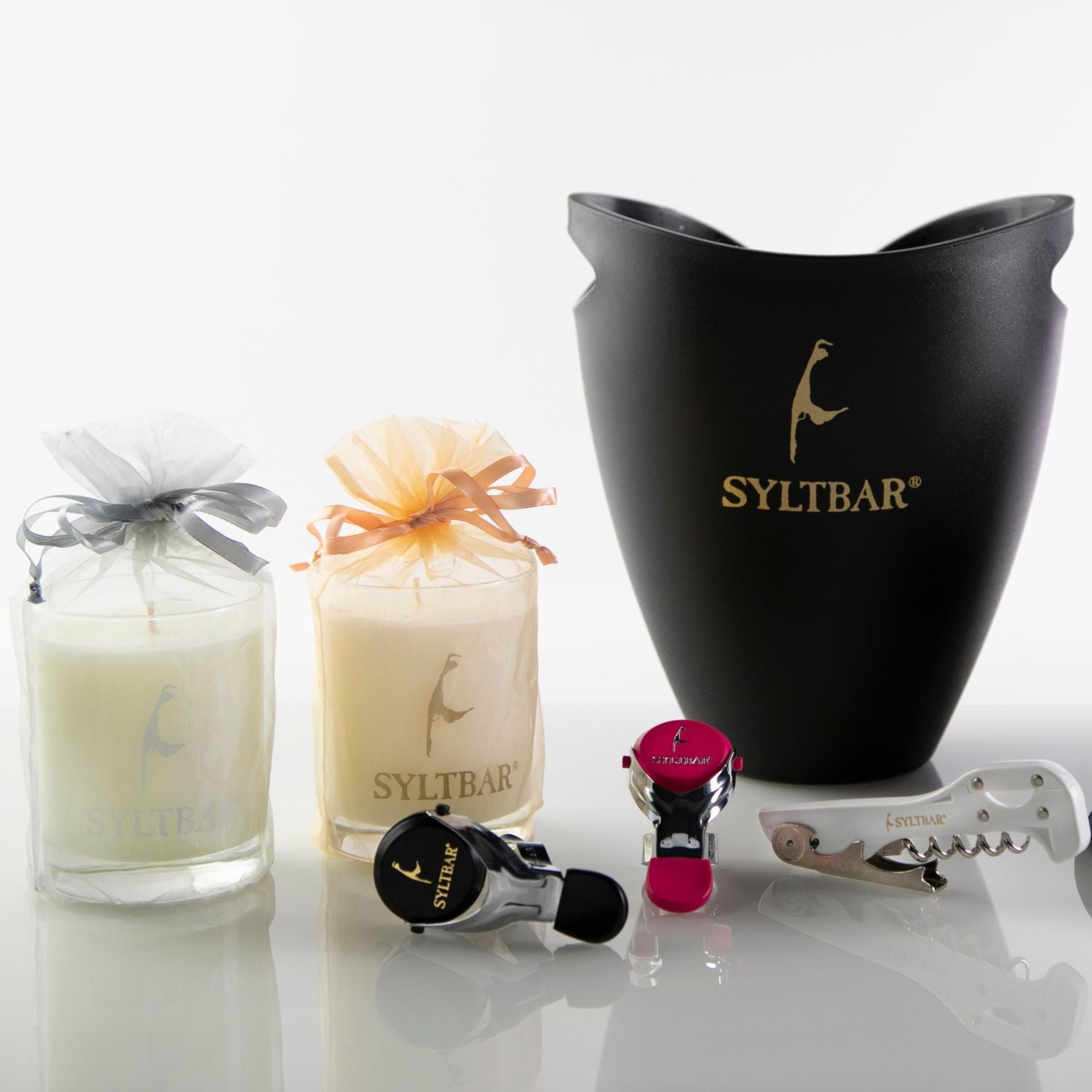 photo of 2 SYLTBAR soy candles, 2 champagne stoppers, corkscrew and black champagne ice bucket